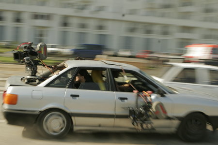 Tom Delmar Stunt Coordinator & 2nd Unit Director with Tudor Lucaciu (DOP) shooting the high speed car chase on location in Bucharest, Romania on 'Razors Edge'.jpg