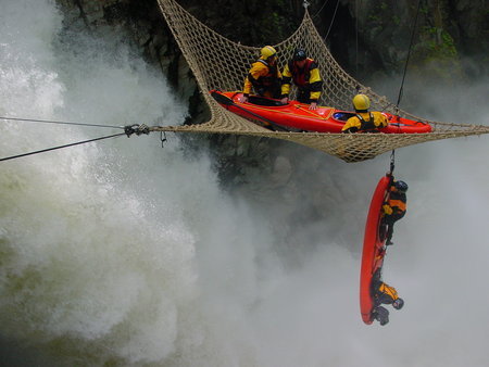 Tom Delmar Stunt Coordinator & 2nd Unit Director. Two Double Kayaks dive over the 120ft waterfall in Vancouver Canada.'Extreme Ops'.jpg