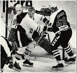 Bo Svenson holding off Bobby Orr in NHL Celebrity All-Stars vs. Boston Bruin Legends at Boston Garden in 1989
