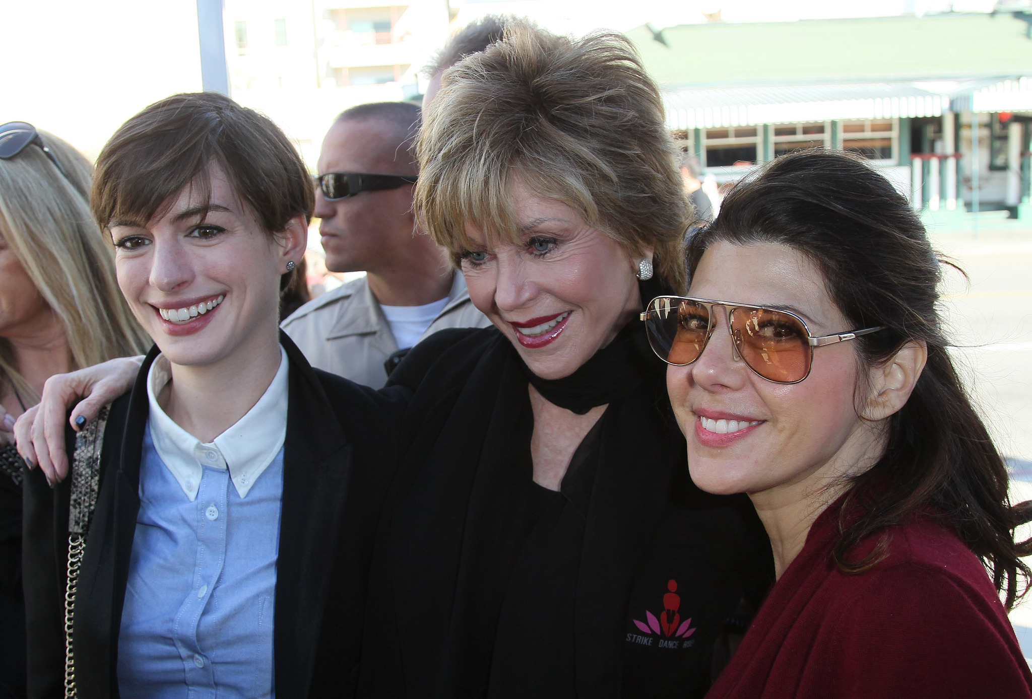 Anne Hathaway, Jane Fonda and Marisa Tomei attend the kick-off for One Billion Rising in West Hollywood on February 14, 2013 in West Hollywood, California.