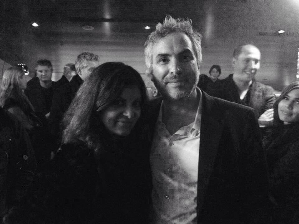 With Alfonso Cuaron at a private party in his honour; pre Golden Globe Awards. Hollywood, CA, USA, January 2014.