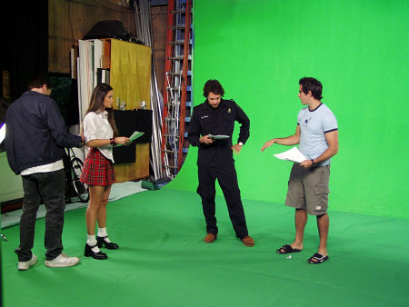 Eli Roth (right) directs Giuseppe Andrews and adult film star Stephanie Swift in a special easter egg scene for the 