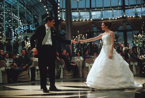 Just-marrieds Jim (JASON BIGGS) and Michelle (ALYSON HANNIGAN) dance on the happiest day of their lives (sort of).