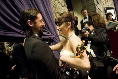 Academy Award®-winner Penelope Cruz (right) with presenter Adrien Brody backstage at the 81st Academy Awards® are presented live on the ABC Television network from The Kodak Theatre in Hollywood, CA, Sunday, February 22, 2009.