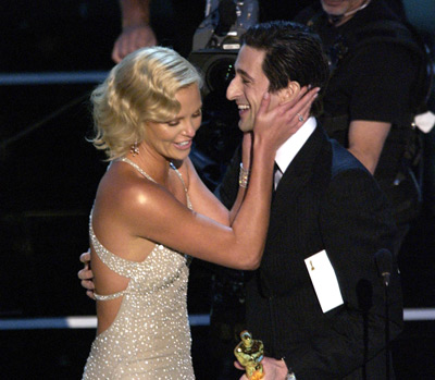 Charlize Theron and Adrien Brody