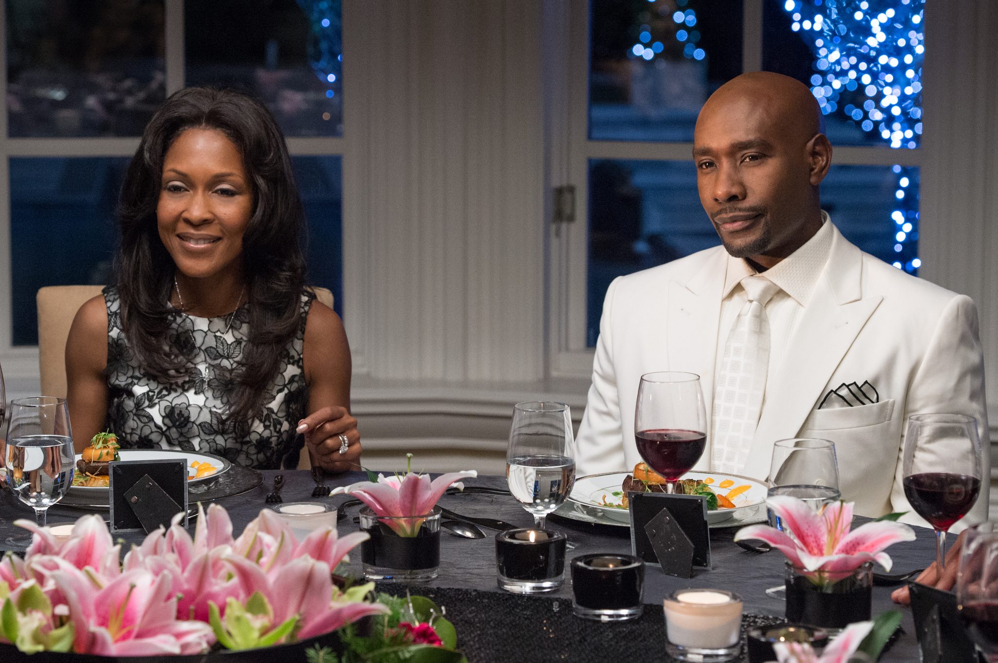 Still of Monica Calhoun and Morris Chestnut in The Best Man Holiday (2013)