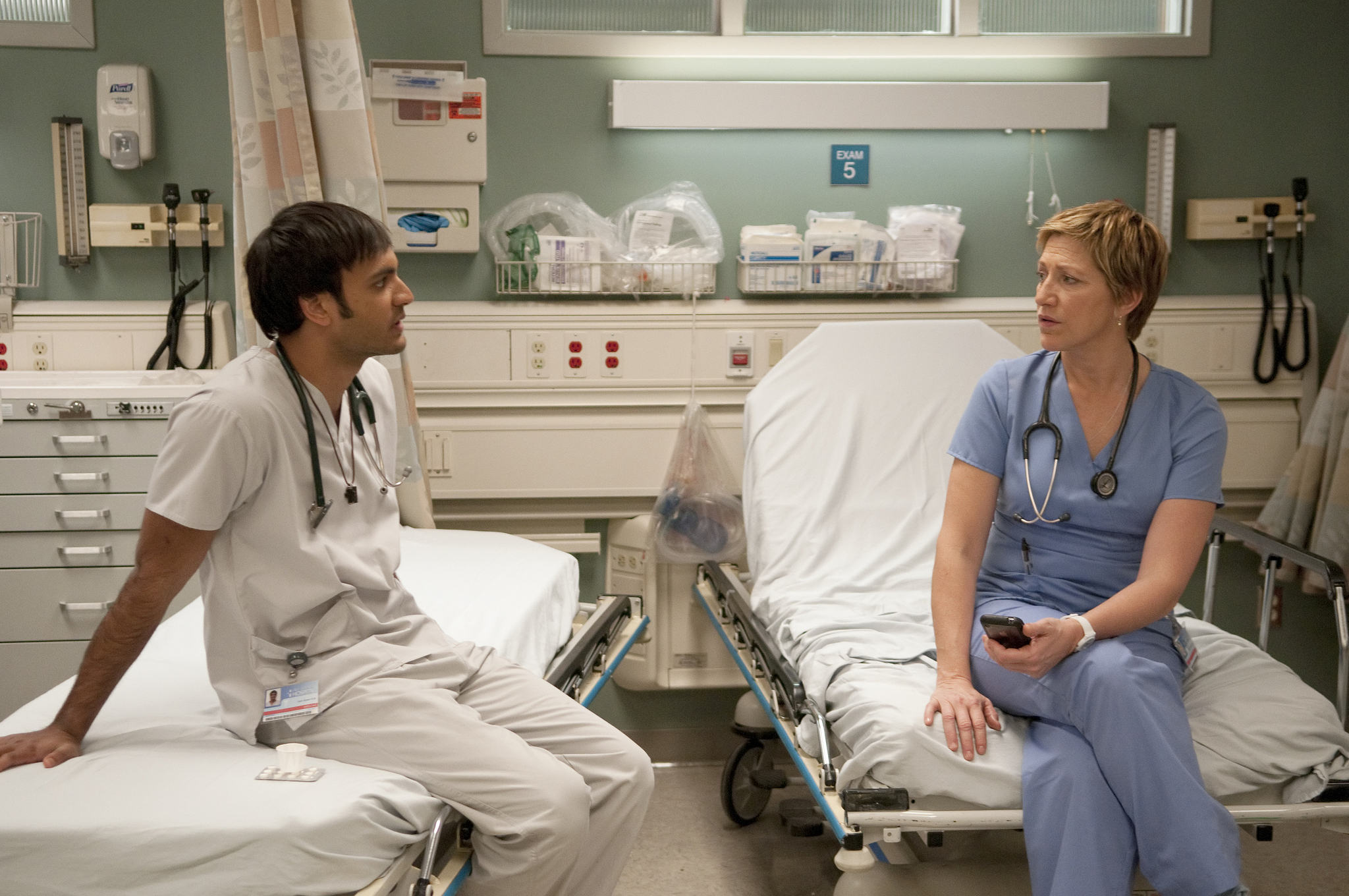 Still of Edie Falco and Arjun Gupta in Nurse Jackie (2009)