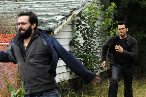 Still of Oded Fehr and Steve Wilkie in Covert Affairs (2010)