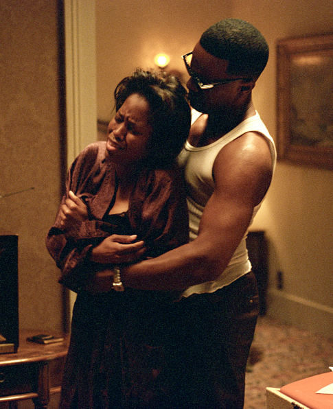 JAMIE FOXX as American legend Ray Charles and REGINA KING as vocalist Margie Hendricks in the musical biographical drama, Ray.