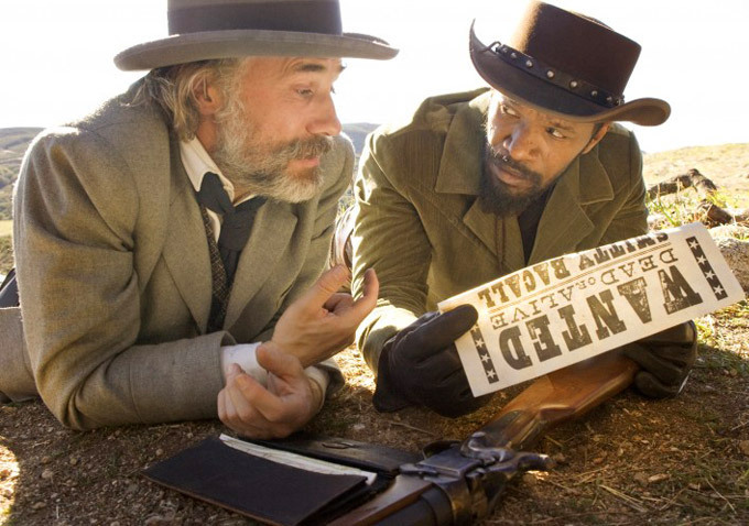 Still of Jamie Foxx and Christoph Waltz in Istrukes Dzango (2012)