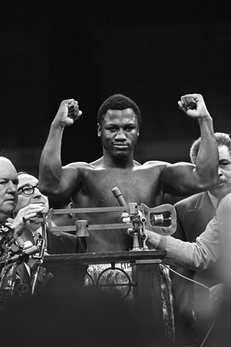 Joe Frazier weighing in before his fight against Muhammad Ali