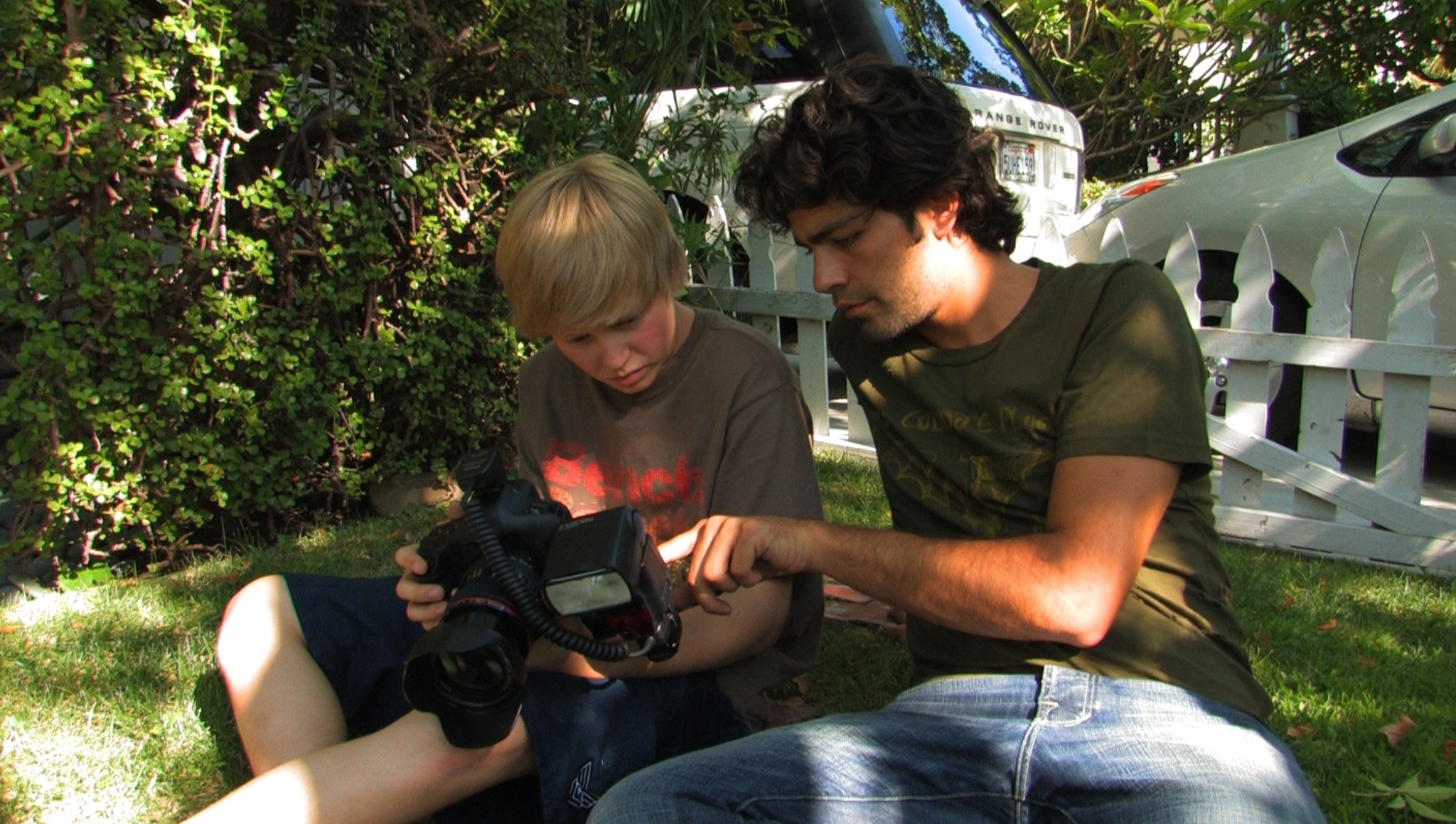Still of Adrian Grenier and Austin Visschedyk in Teenage Paparazzo (2010)