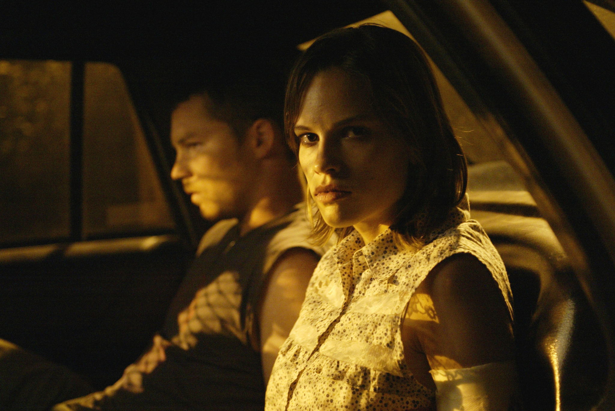 Still of Shawn Hatosy and Hilary Swank in 11:14 (2003)
