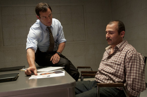 Still of Jason Isaacs and Lombardo Boyar in Awake (2012)