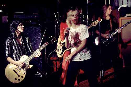 The Runaways (Joan Jett, Jackie Fox, Lita Ford, Cherie Currie) performing at CBGB in New York City on August 2, 1976