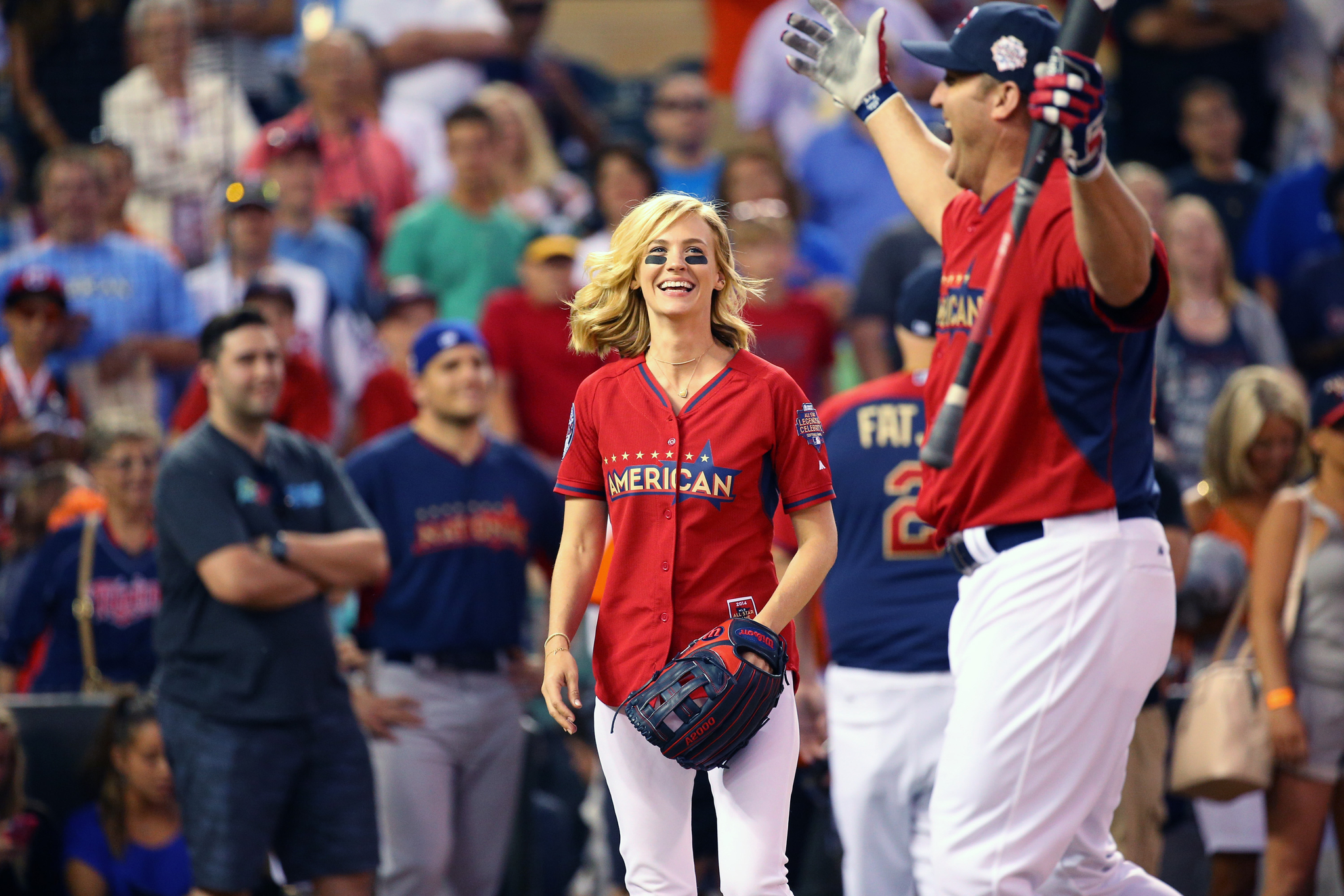 January Jones celebrates at the 2014 MLB All-Star legends and celebrity softball game on July 13, 2014 at the Target Field in Minneapolis, Minnesota.