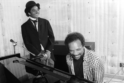 Michael Jackson and Quincy Jones composing songs in a Los Angeles recording studio