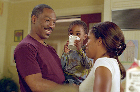 Eddie Murphy, left, plays an out of work dad who agrees to mind his son (Khamani Griffin, center), so his wife (Regina King) can return to work.