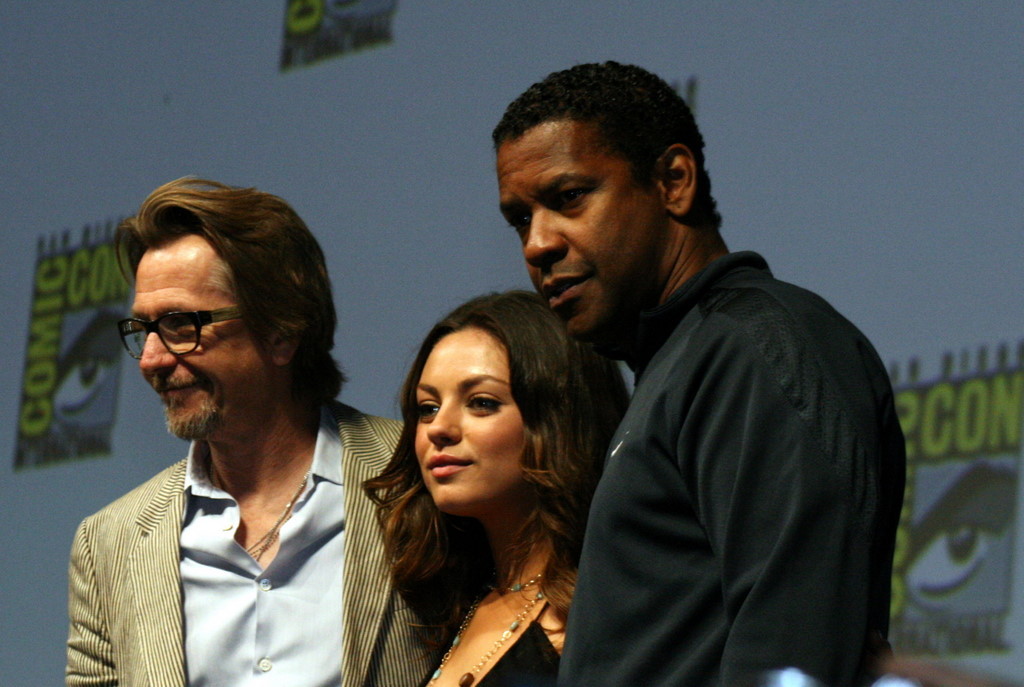 Gary Oldman, Mila Kunis, Denzel Washington after their panel promoting The Book of Eli