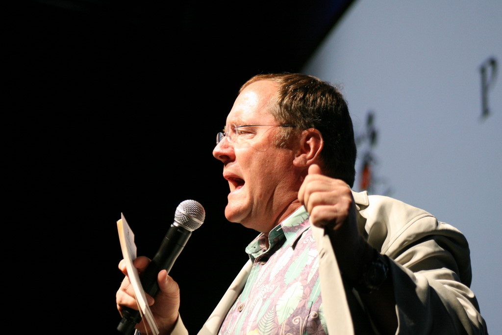 John Lasseter asks the back of the hall if his shirt is loud enough before discussing several upcoming Disney animation projects.