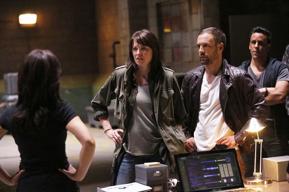 Still of Lucy Lawless and Wilmer Calderon in Agents of S.H.I.E.L.D. (2013)