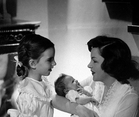 Judy Garland with daughters Liza Minnelli and Lorna Luft (baby), 1953.
