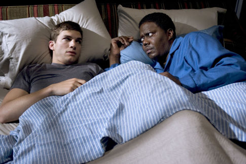 Ashton Kutcher (l) and Bernie Mac star in Columbia Pictures/Regency Enterprises' new comedy Guess Who.