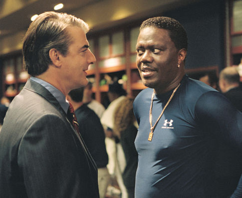 Milwaukee Brewers General Manager, Schembri (Chris Noth, left) is thrilled to have Stan Ross (Bernie Mac, right) back on the team.