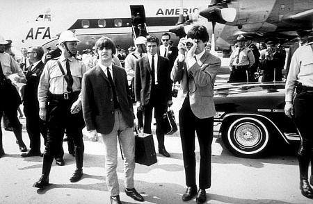 The Beatles Ringo Starr, Derek Taylor (Press Officer), & Paul McCartney shooting with a camera, Toronto, Canada, September 7, 1964