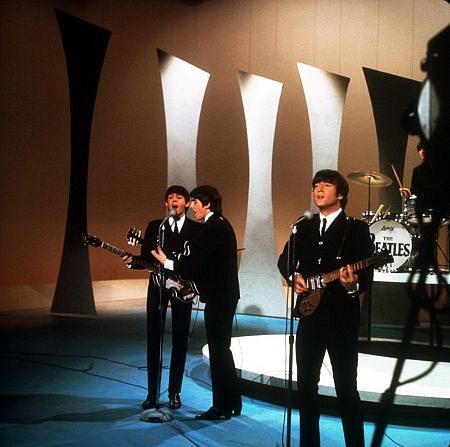 The Beatles ( George Harrison, Paul McCartney, Ringo Starr, John Lennon) on the Ed Sullivan Show, 1964