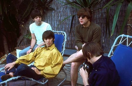 The Beatles ( Paul McCartney, George Harrison, John Lennon, Ringo Starr along the poolside. Ringo plays around with his camera.), 1964