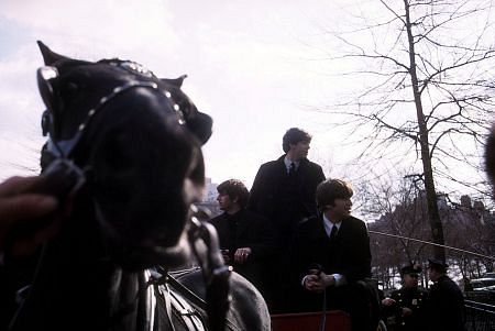 The Beatles ( Ringo Starr, Paul McCartney, John Lennon, on a horse carriage ride), 1964