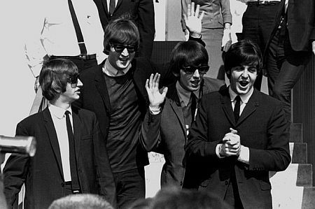 The Beatles arriving in Los Angeles, 1964. Modern silver gelatin, 11x14, matted on 16x20 board, signed. $600 © 1978 Bud Gray MPTV