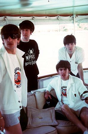The Beatles, (Ringo Starr, John Lennon, George Harrison, Paul McCartney) on board ship.