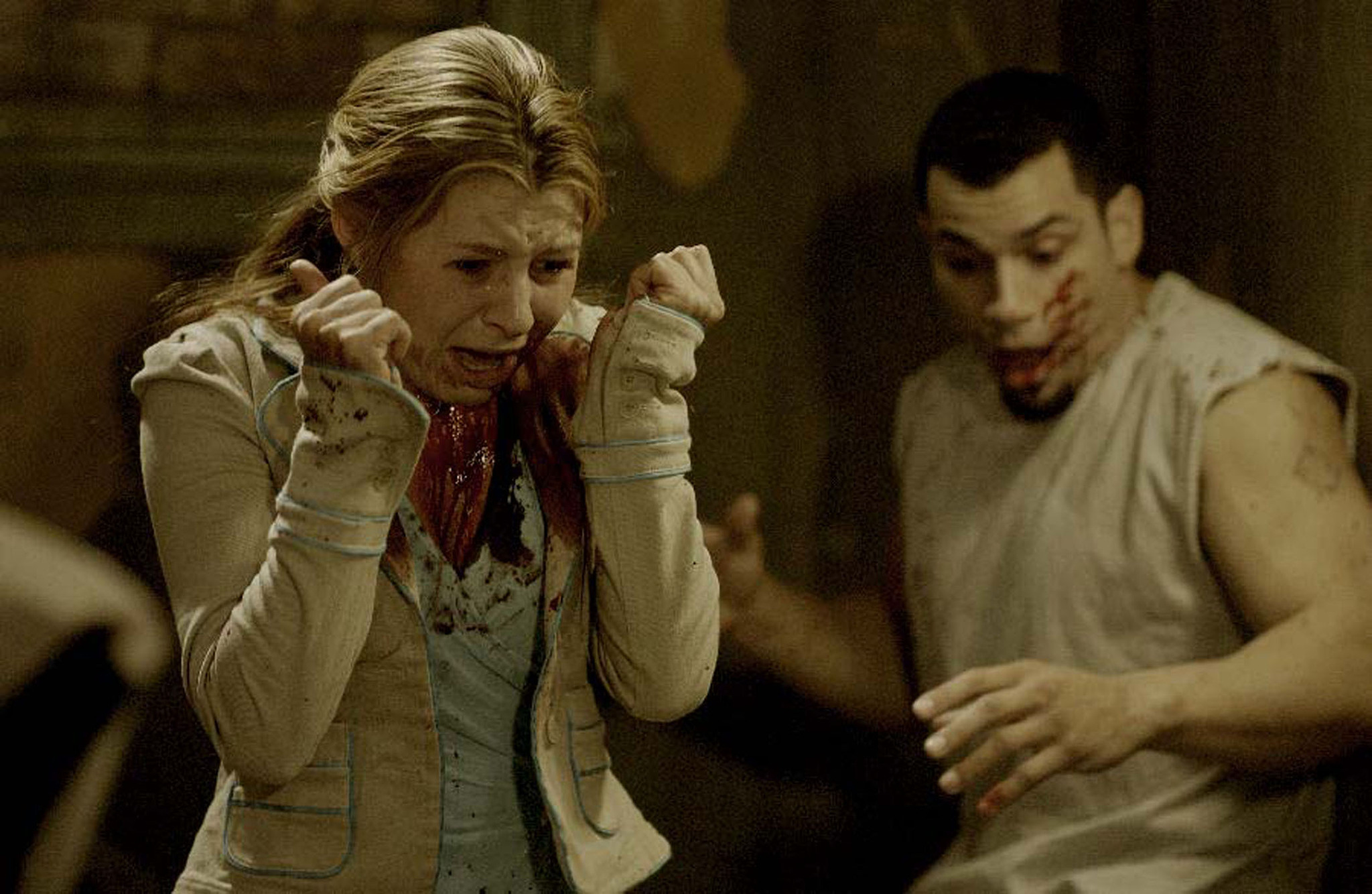 Still of Beverley Mitchell and Franky G in Saw II (2005)