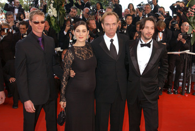 Keanu Reeves, Carrie-Anne Moss, Hugo Weaving and Adrian Rayment at event of Matrica: Perkrauta (2003)