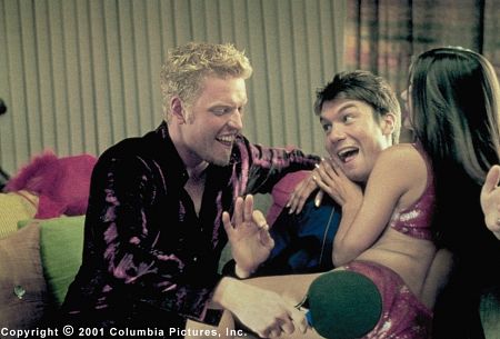 Michael Delaney (Jerry O'Connell, center) celebrates at a bachelor party for Kyle (Jake Busey), the buddy he is marrying off in order to win a bet that will pay off his Vegas casino creditors