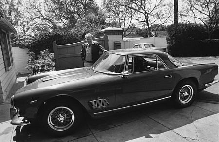 Carroll O'Connor and his 1962 Maserati 3500 at home in Los Angeles, CA C. 1974