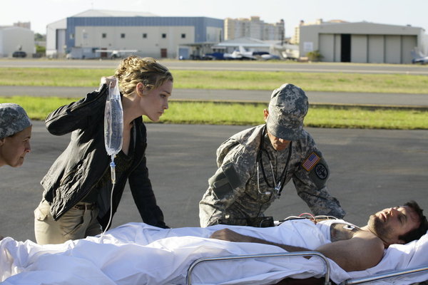 Still of Piper Perabo and Eion Bailey in Covert Affairs (2010)