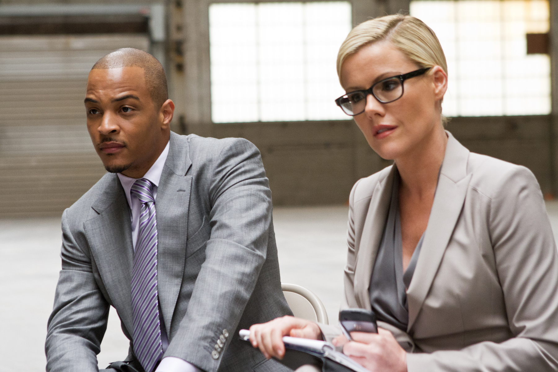 Still of Kathleen Robertson and T.I. in Boss (2011)