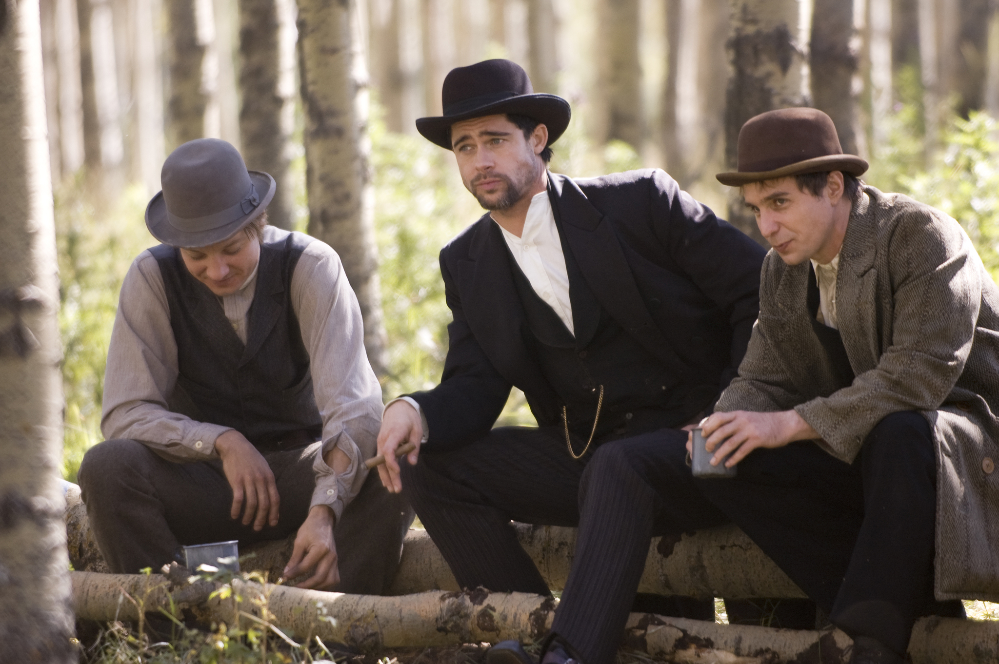 Still of Brad Pitt, Sam Rockwell and Jeremy Renner in The Assassination of Jesse James by the Coward Robert Ford (2007)