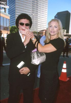 Shannon Tweed and Gene Simmons at event of The General's Daughter (1999)