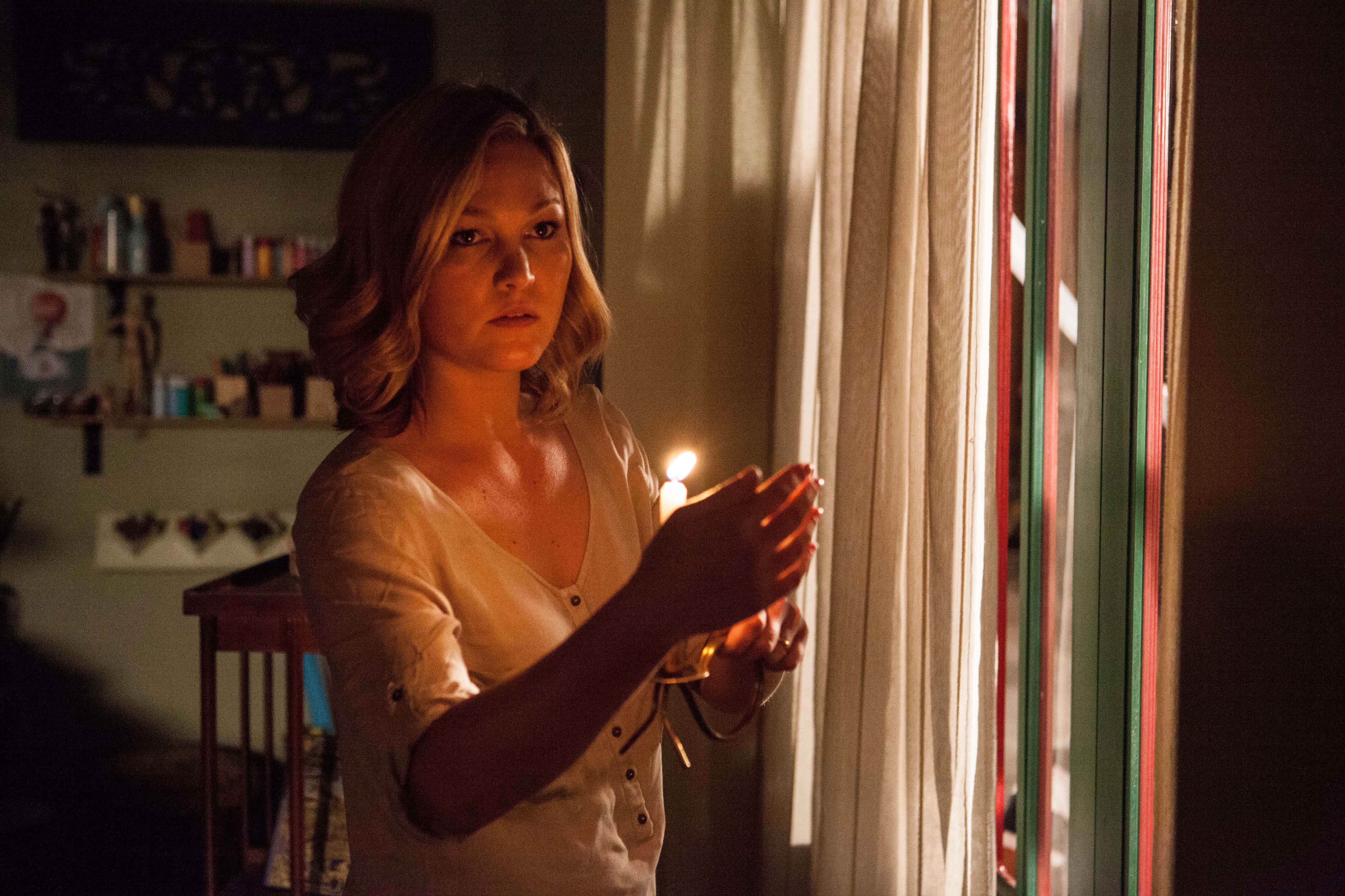 Still of Julia Stiles in Out of the Dark (2014)
