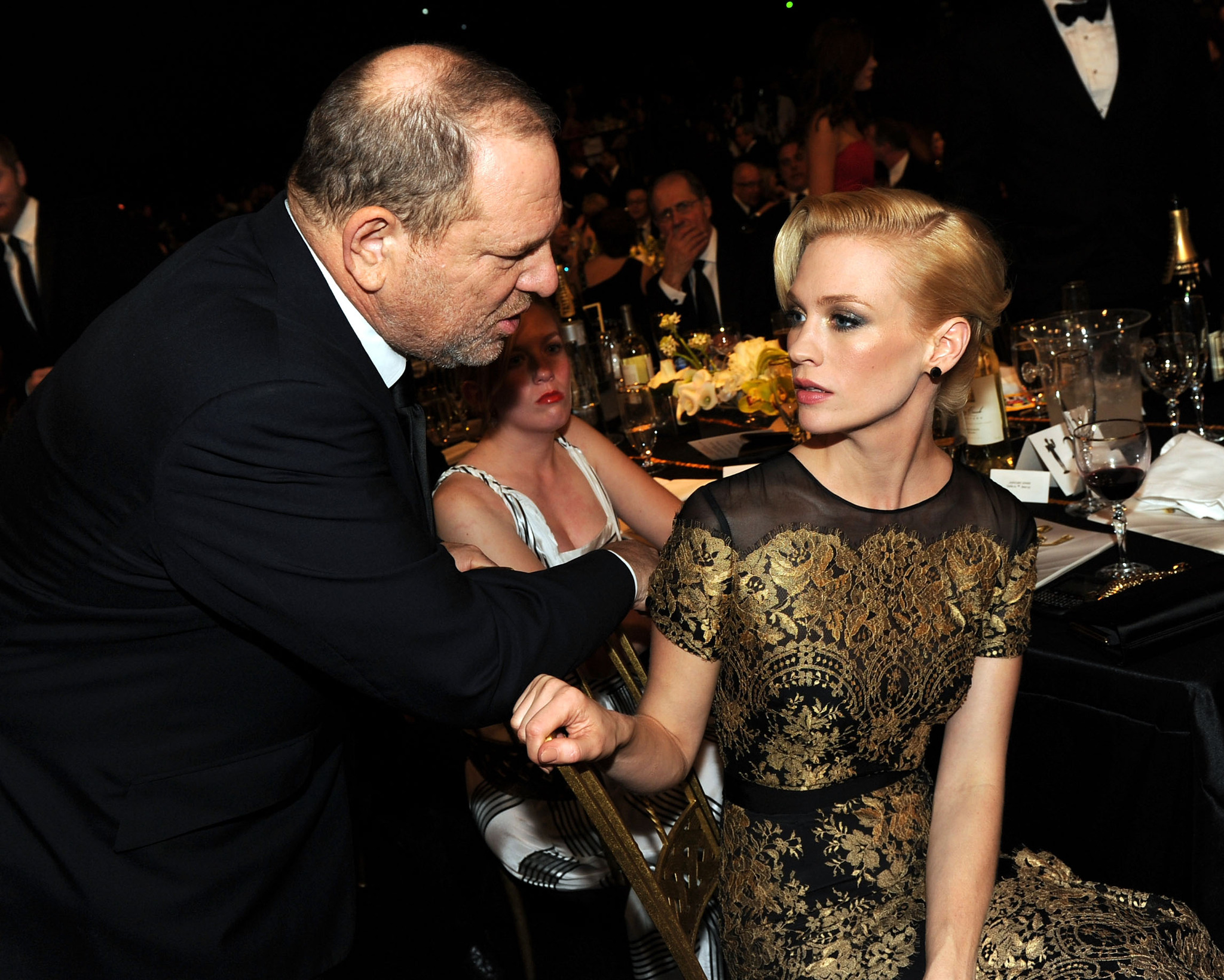 January Jones and Harvey Weinstein