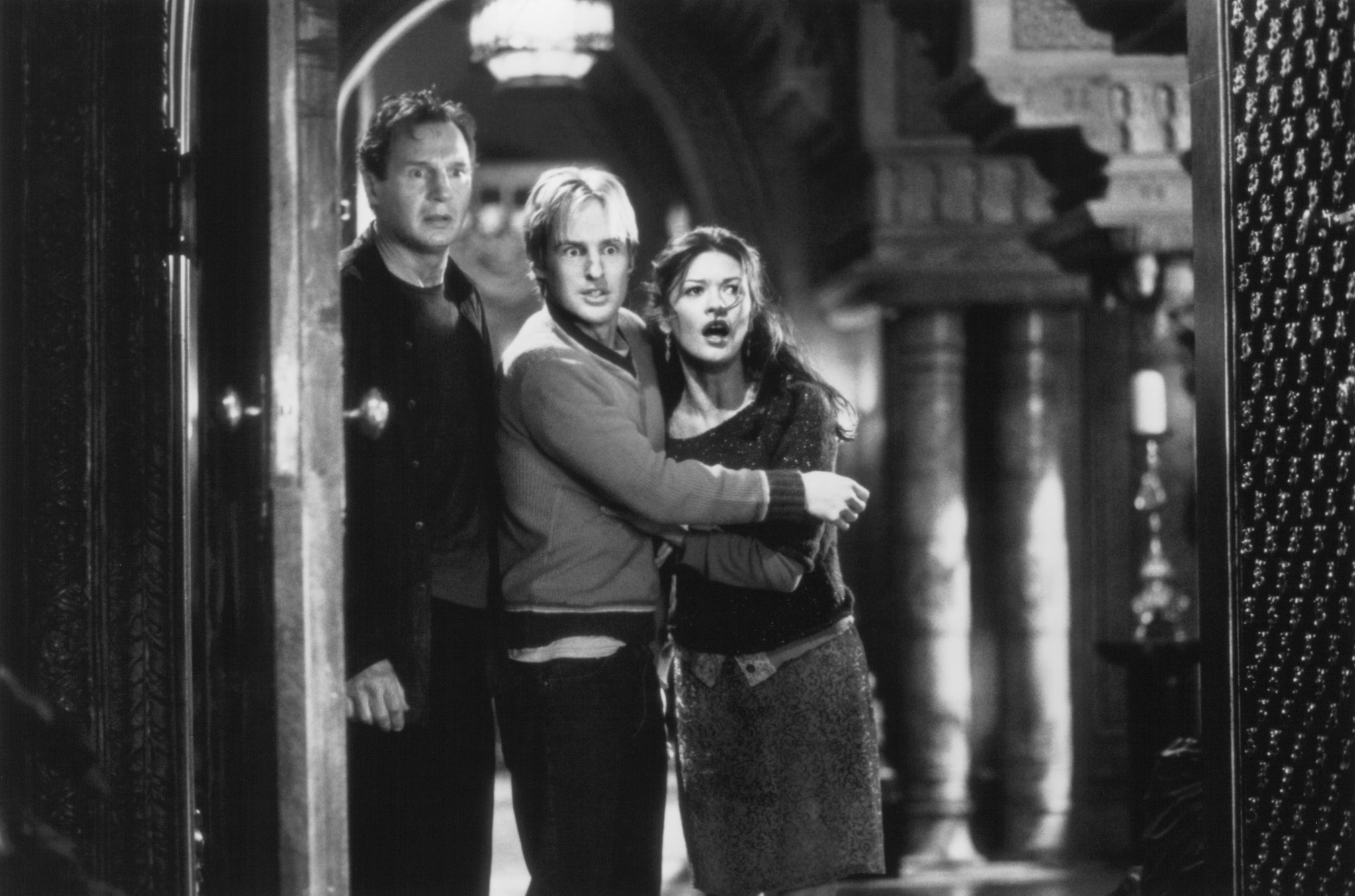 Still of Liam Neeson, Catherine Zeta-Jones and Owen Wilson in The Haunting (1999)
