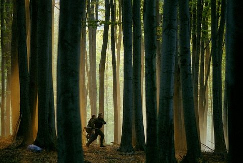 In a race against time and a deadly enemy, Burnett (OWEN WILSON) and Babic (KAMIL KOLLARIK) traverse a Bosnian forest.