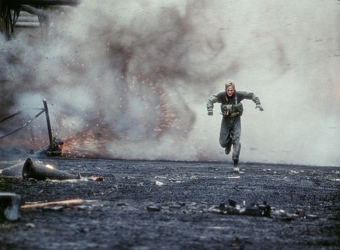 Burnett (OWEN WILSON) flees a calamitous domino effect of explosions triggered by pursuing enemy troops.