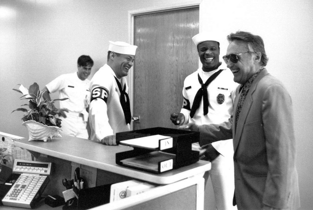 Grand L. Bush and Matthew Glave share laughs with director Dennis Hopper between takes during filming of CHASERS. Bush and Hopper were close friends.