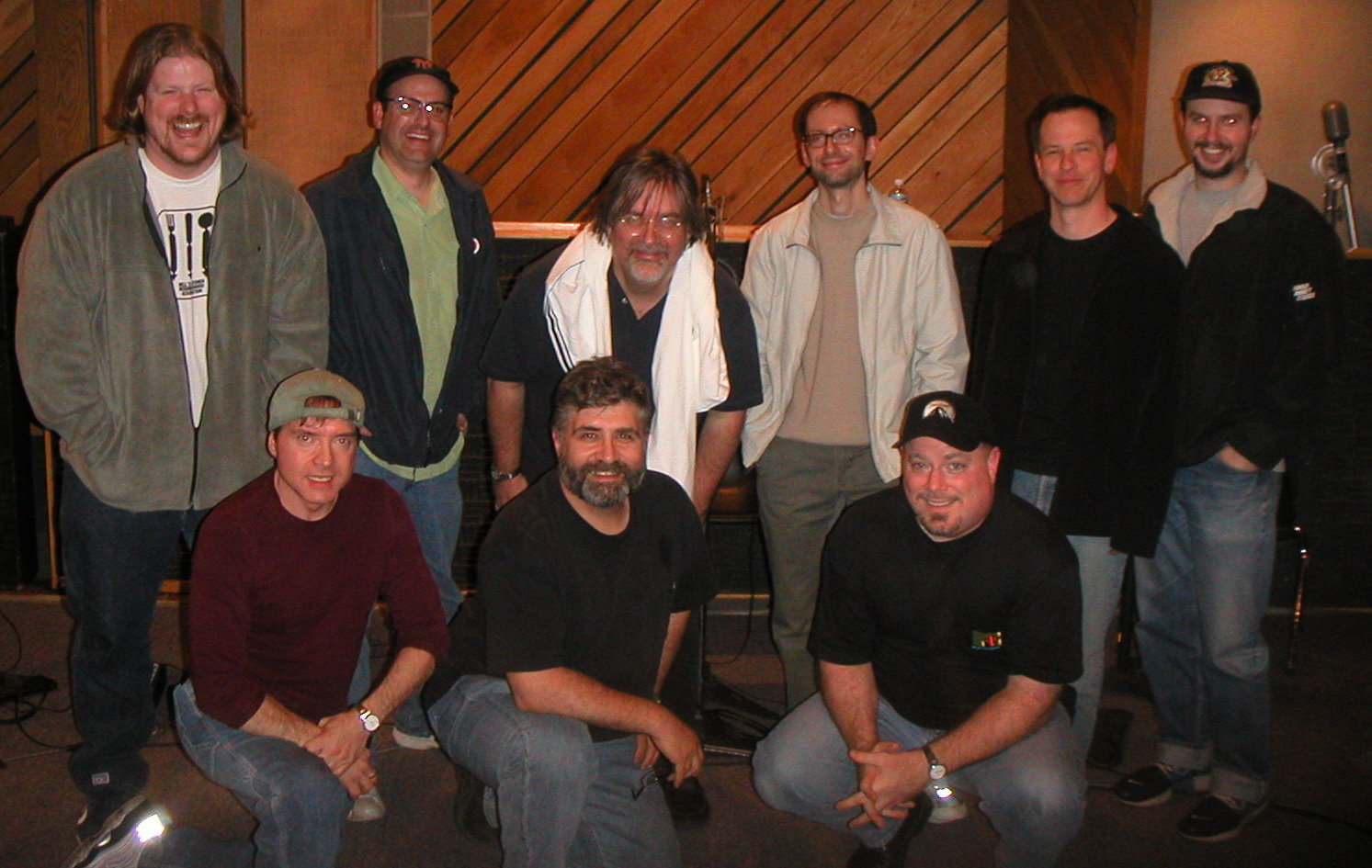 Top row, John DiMaggio, Brian Sheesley, Matt Groening, David X. Cohen, Rich Moore, James Purdum, Bottom row, Billy West, Maurice LaMarche, Mike Rowe