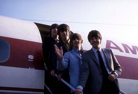 The Beatles, (John Lennon, George Harrison, Ringo Starr, Paul McCartney) getting off the plane.